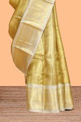 Bright gold zari design art tissue saree with contrast zari border and blouse