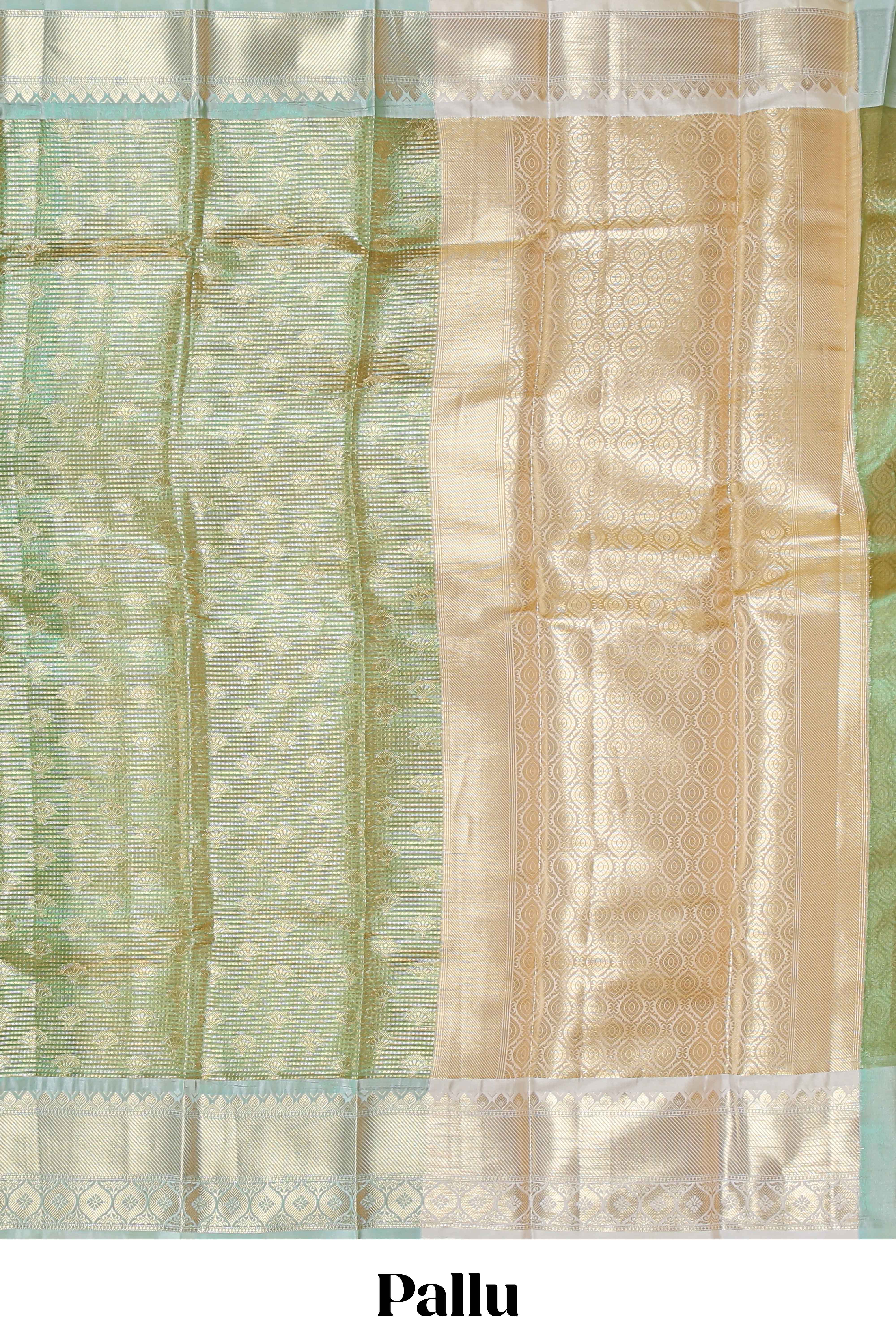 Green zari motifs design art tissue saree with contrast zari border and motifs blouse