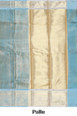 Blue zari design art tissue saree with self zari border and contrast blouse