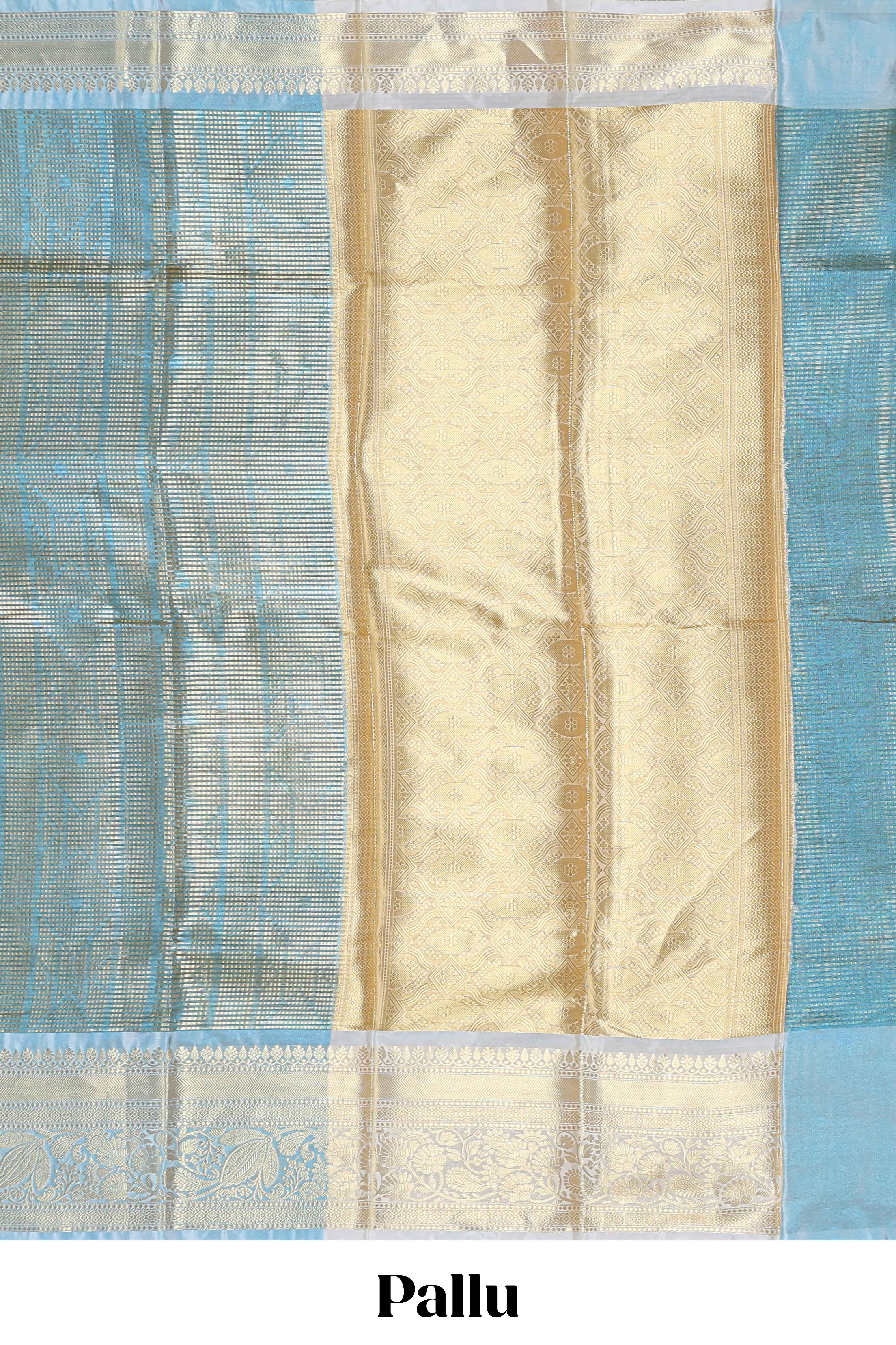 Blue zari design art tissue saree with self zari border and contrast blouse