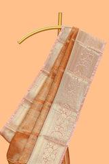 Orange zari design art tissue saree with contrast zari border and contrast blouse