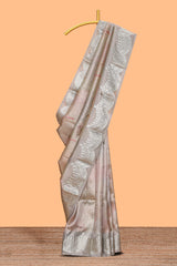 Grey shade zari design art tissue saree with self zari border and matching blouse