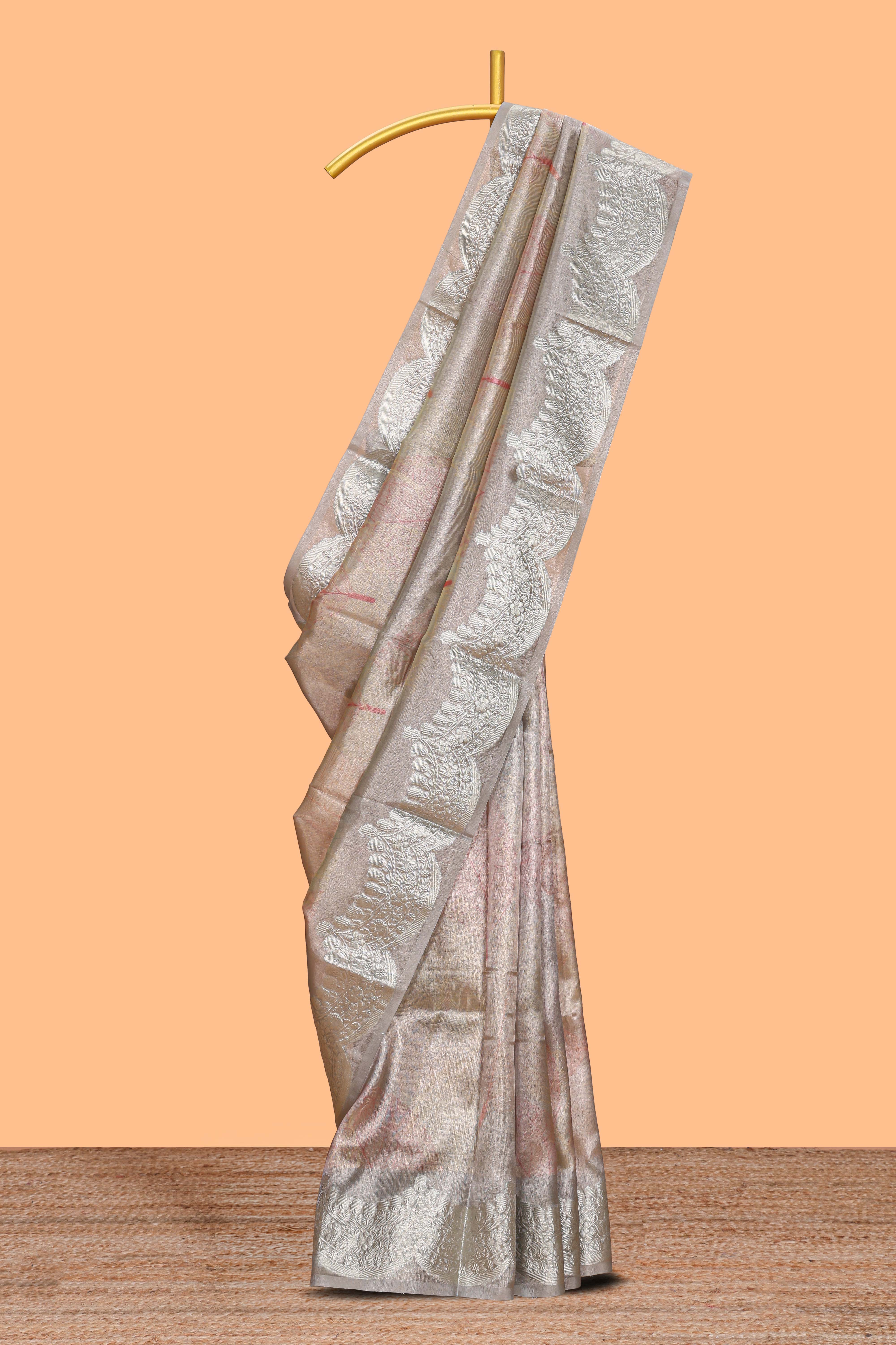 Grey shade zari design art tissue saree with self zari border and matching blouse