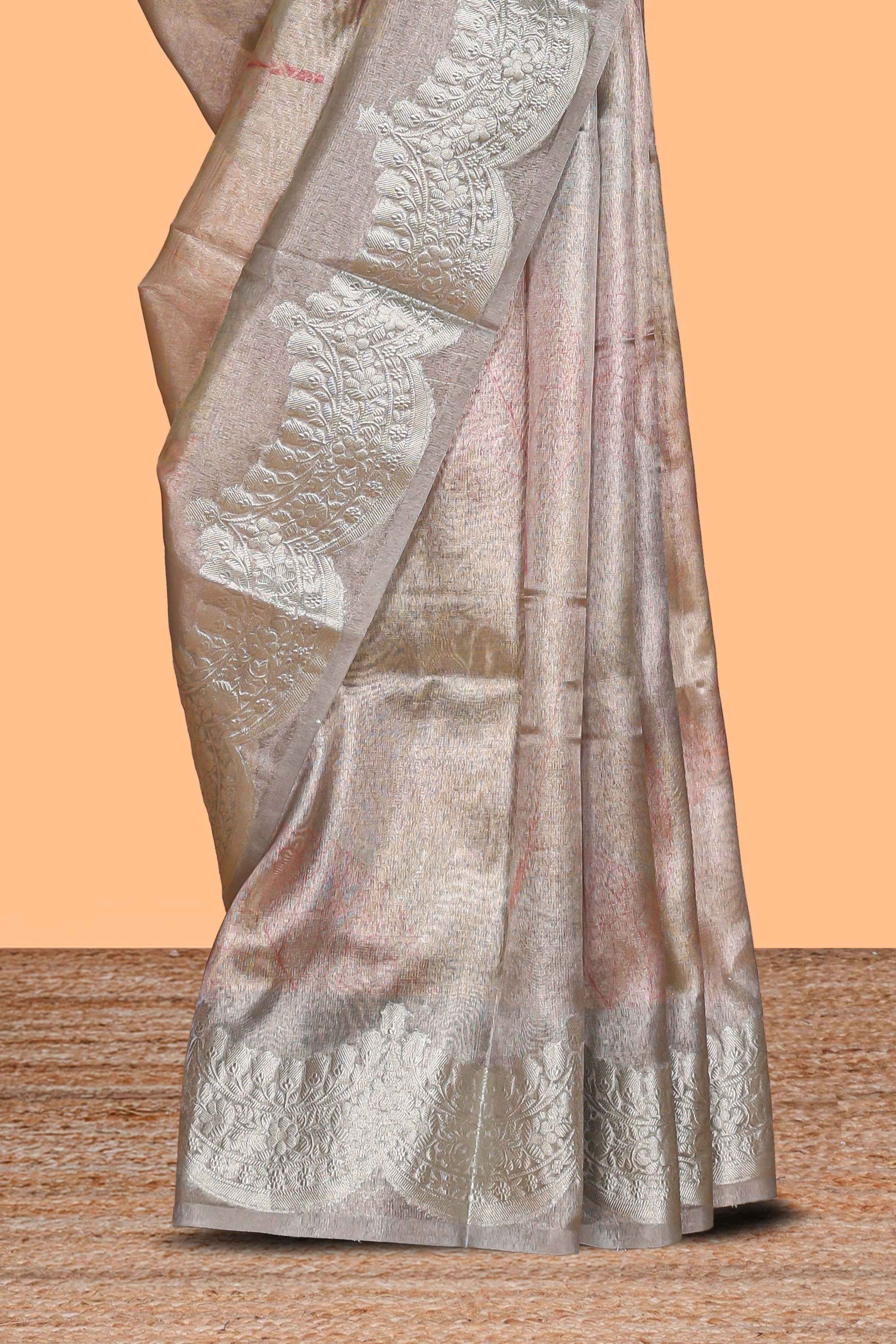 Grey shade zari design art tissue saree with self zari border and matching blouse