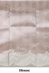 Grey shade zari design art tissue saree with self zari border and matching blouse