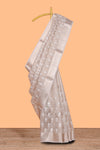 Beige floral butta art tissue saree with with self zari border and plain blouse
