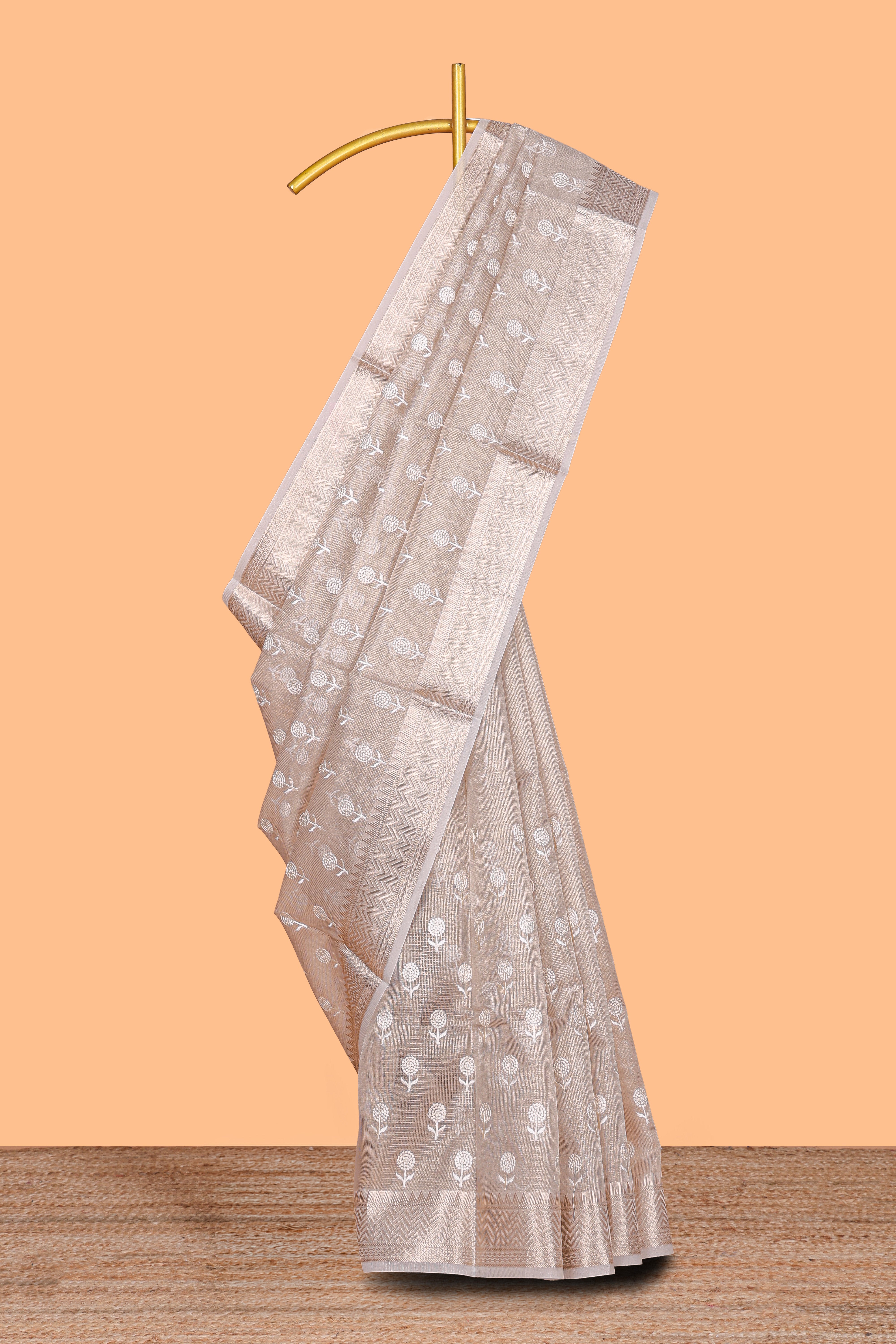 Beige floral butta art tissue saree with with self zari border and plain blouse