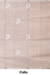 Almond beige unique design art tissue saree with flora design pallu and plain blouse