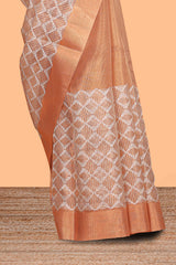 Orange geometric design art tissue saree with self zari border and plain blouse