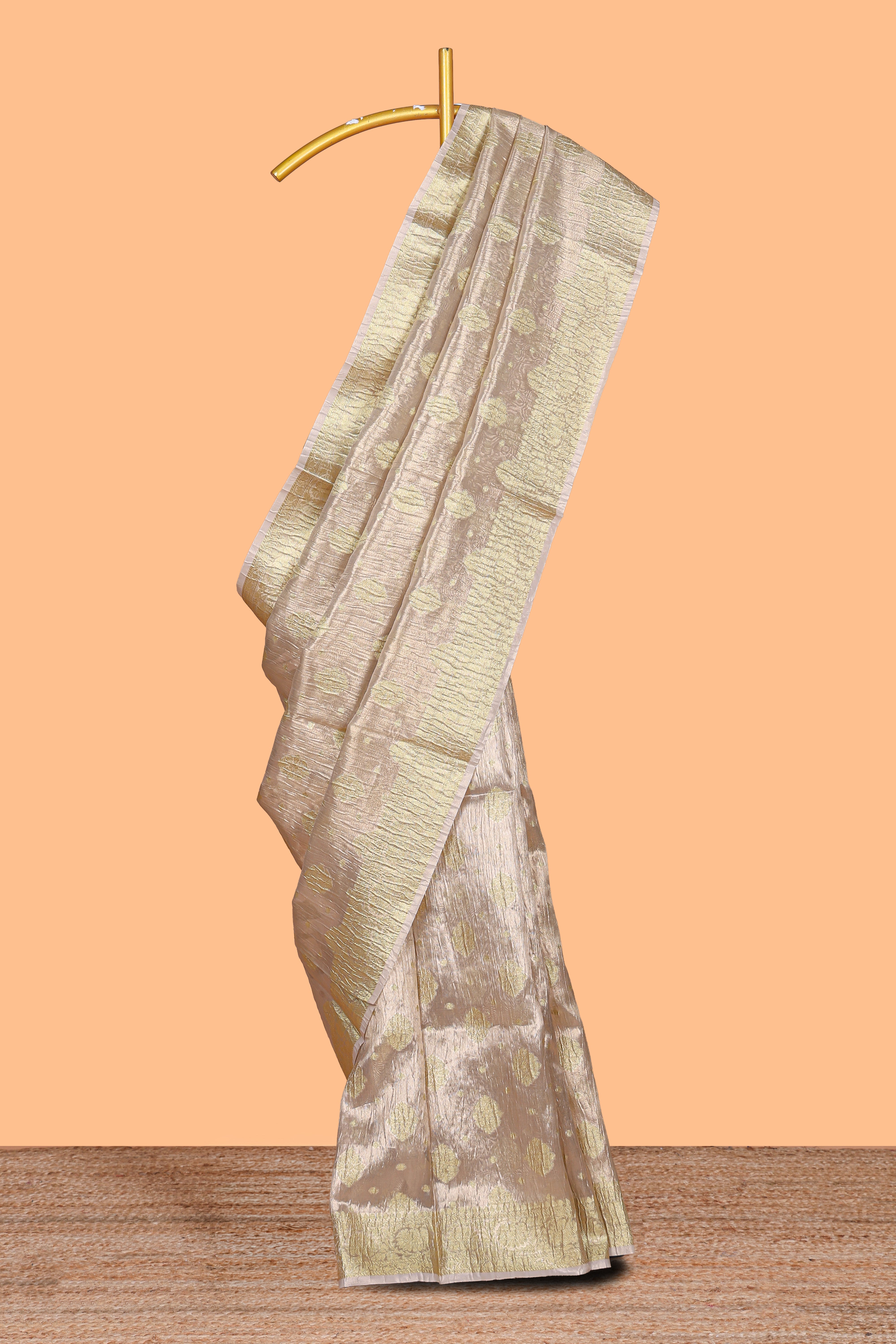 Rose gold color butta designs art tissue saree with zari border and plain blouse