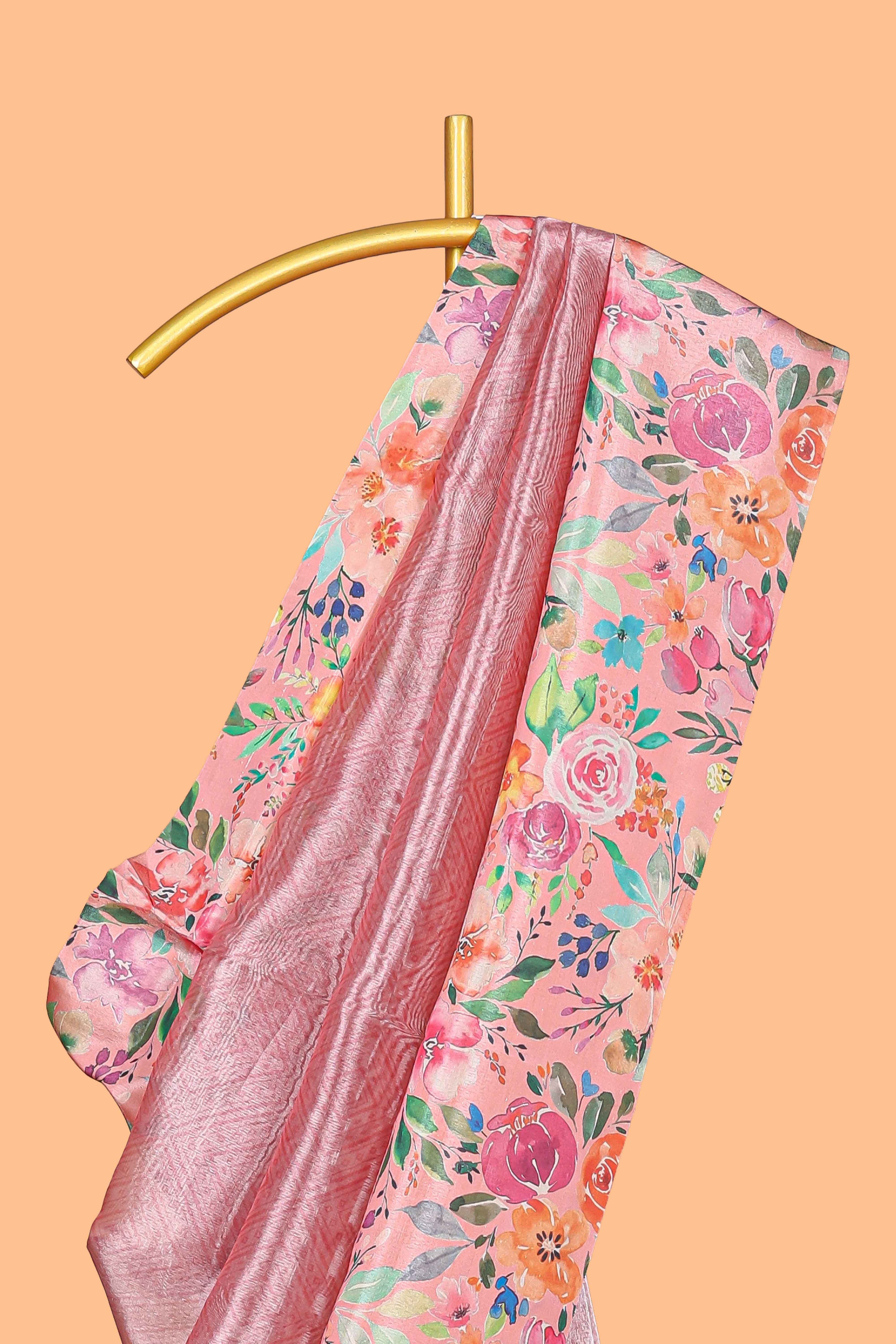 Peach shade plain art tissue saree with contrast colorful floral border and blouse