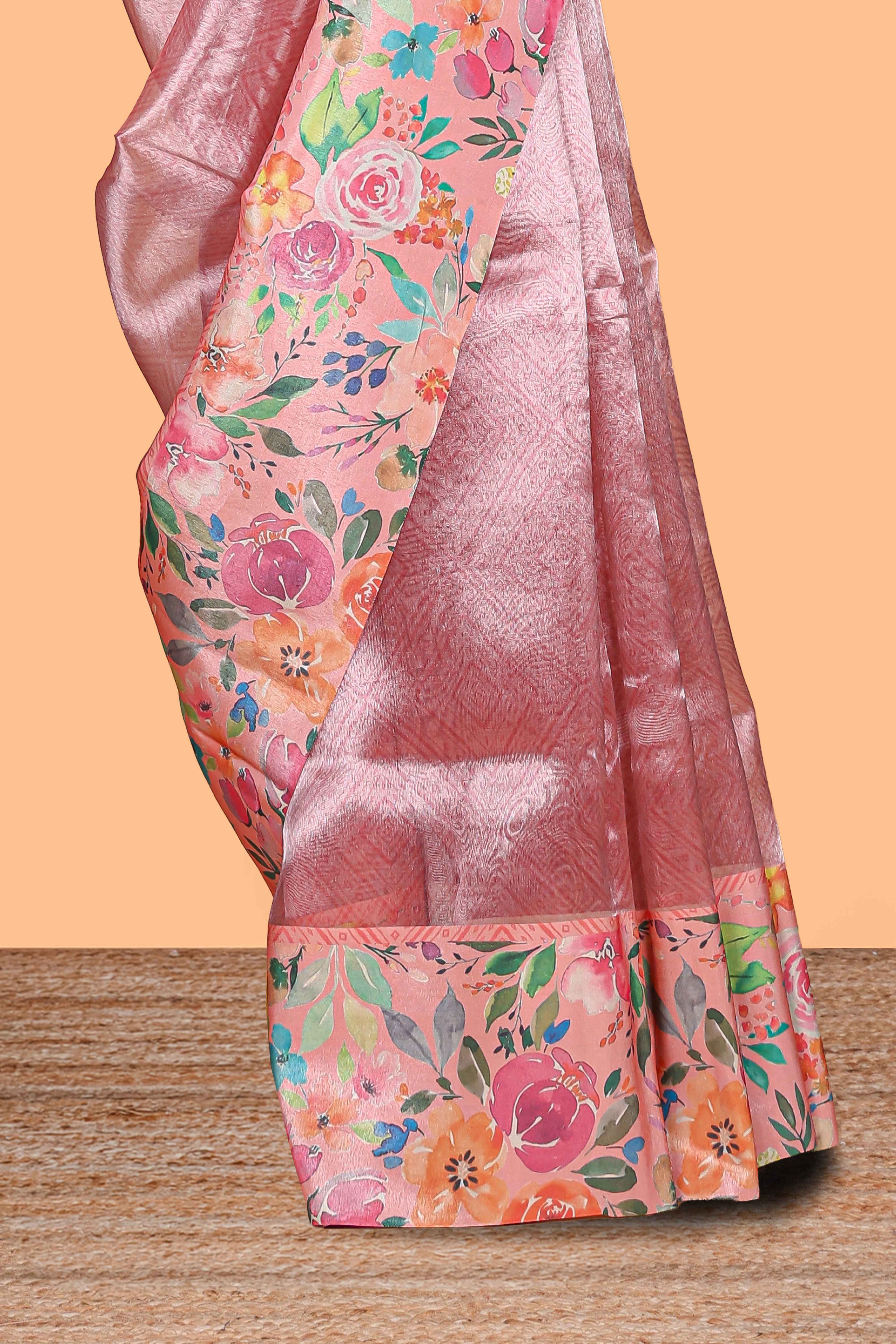 Peach shade plain art tissue saree with contrast colorful floral border and blouse