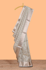 Silver grey shade geometric design art tissue saree with zari border and bouse