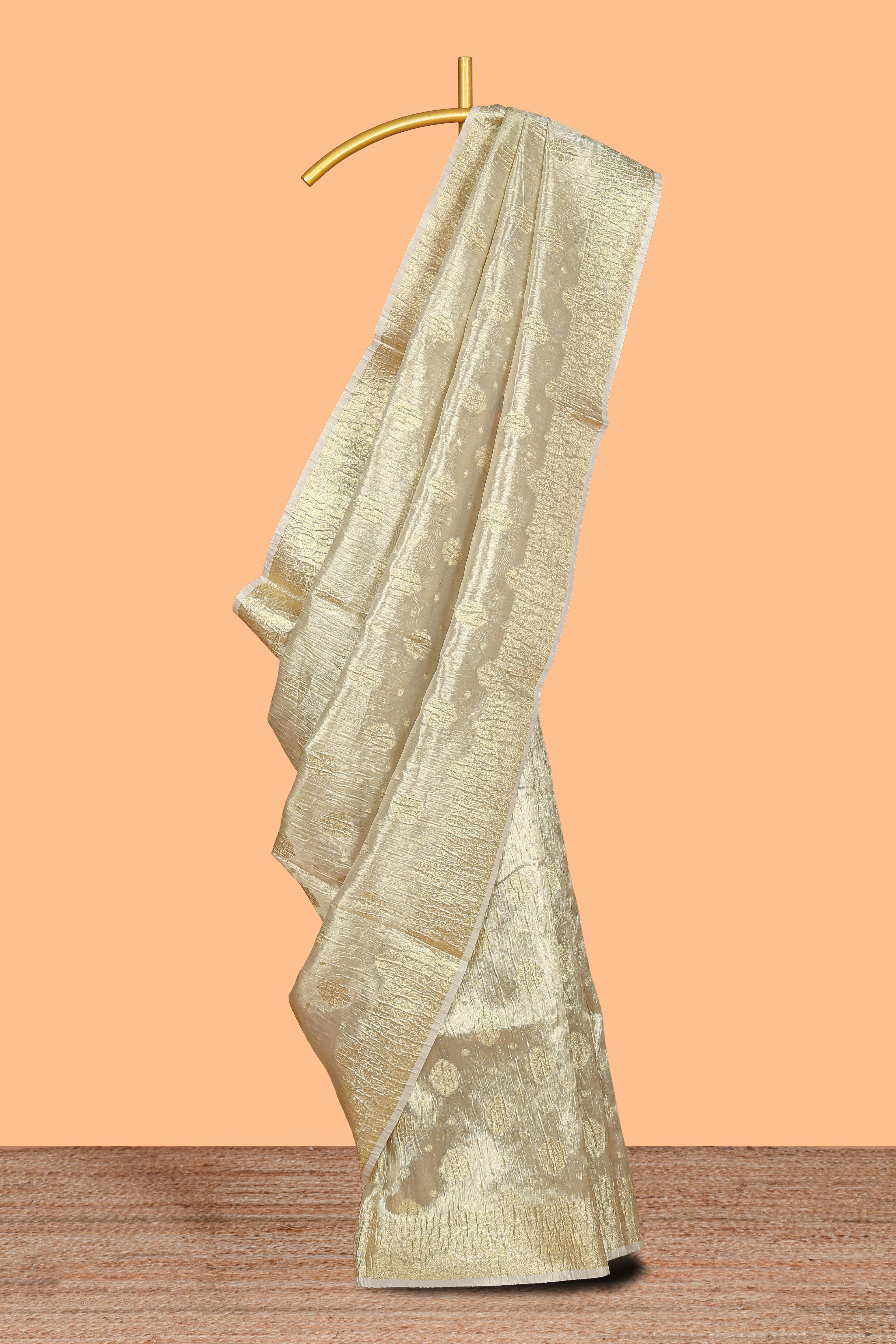 Gold color butta designs art tissue saree with zari border and plain blouse