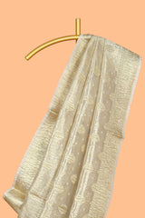 Gold color butta designs art tissue saree with zari border and plain blouse