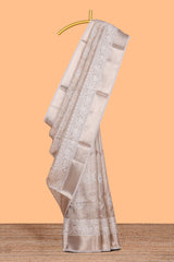 Almond beige Floral vine and ornamental motifs art tissue saree with self zari border and Matching blouse