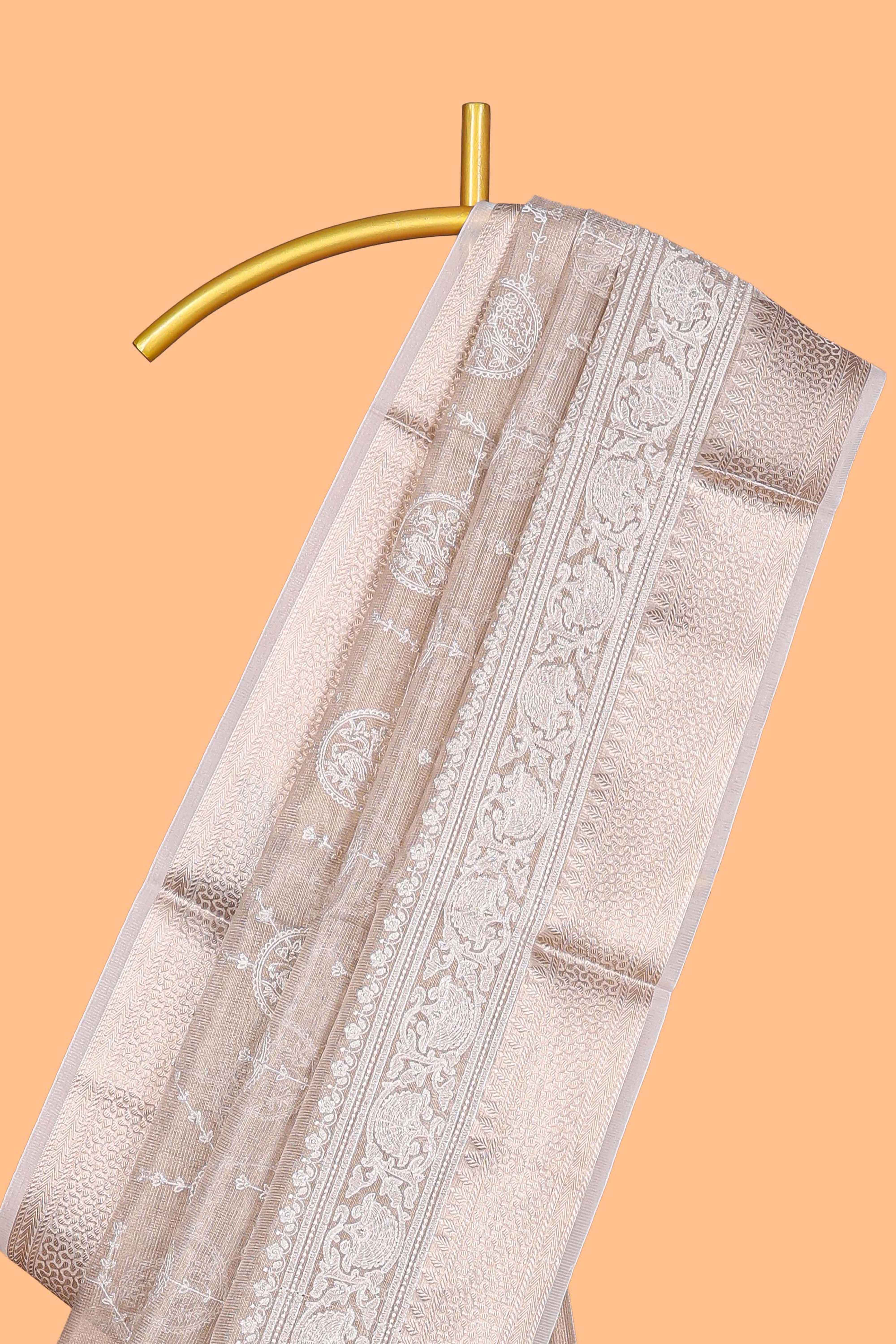 Almond beige Floral vine and ornamental motifs art tissue saree with self zari border and Matching blouse
