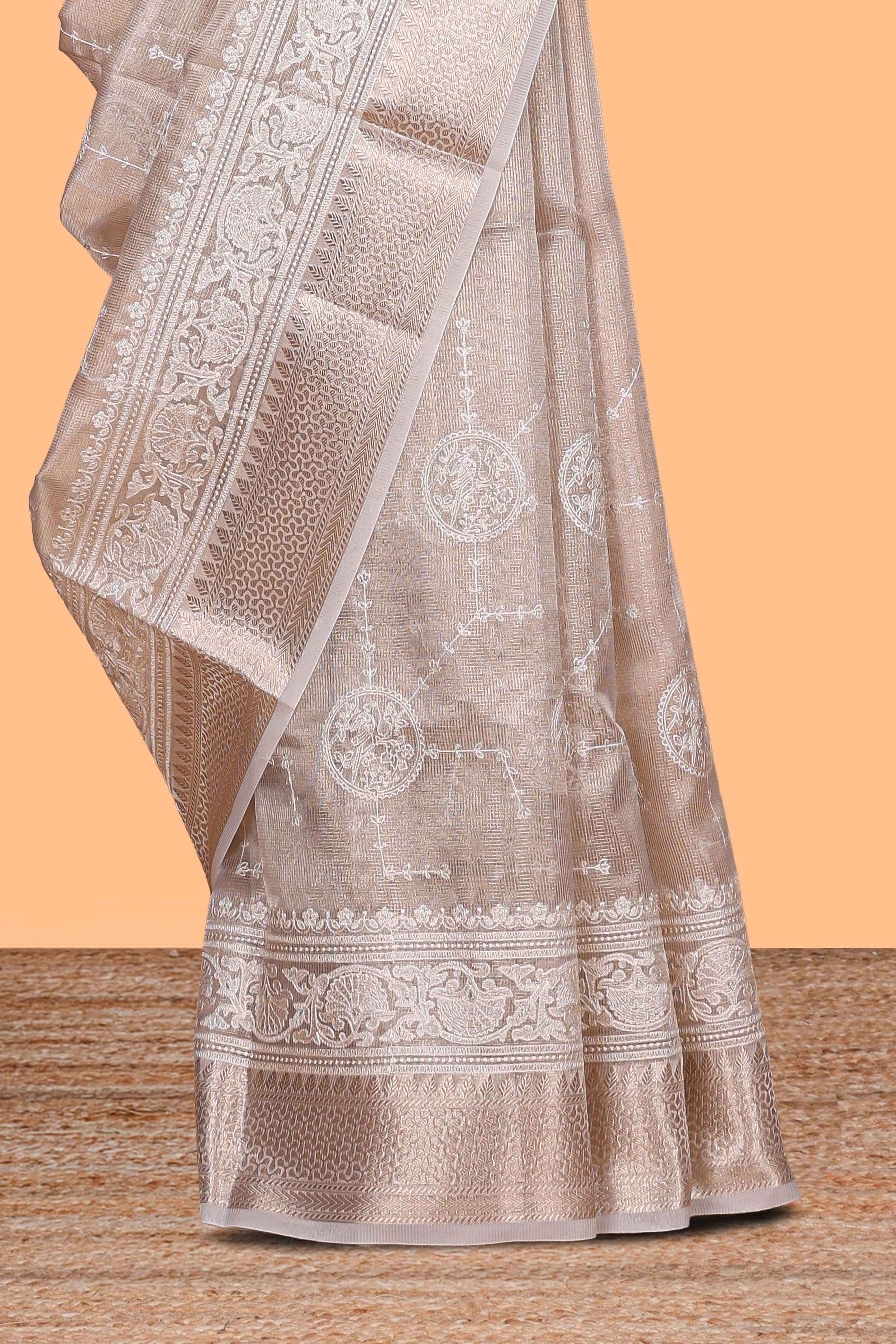 Almond beige Floral vine and ornamental motifs art tissue saree with self zari border and Matching blouse