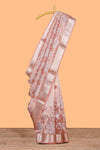 Peach floral design art tissue saree with self zari border and Matching blouse along with the floral designed pallu