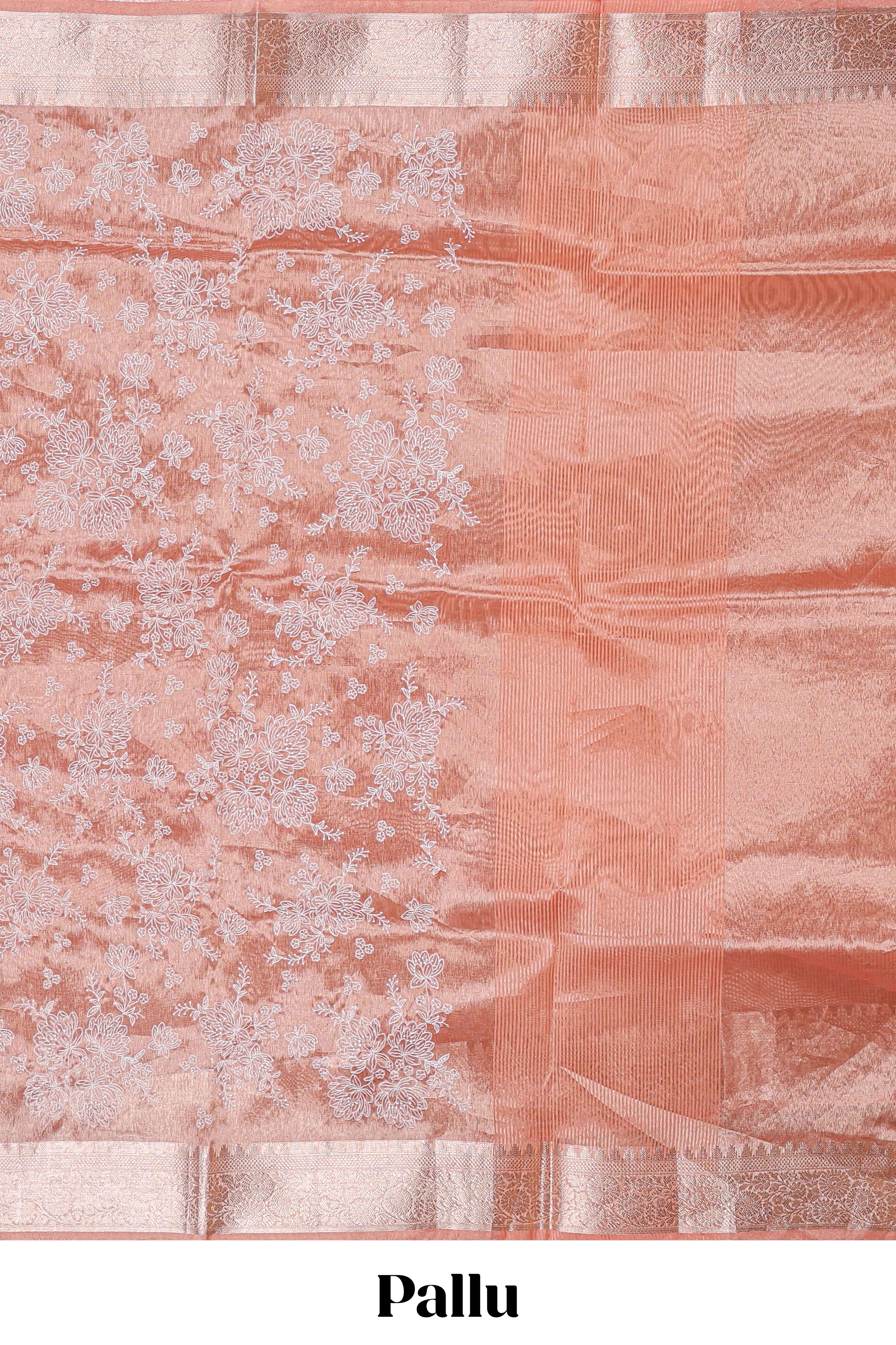 Peach floral design art tissue saree with self zari border and Matching blouse along with the floral designed pallu