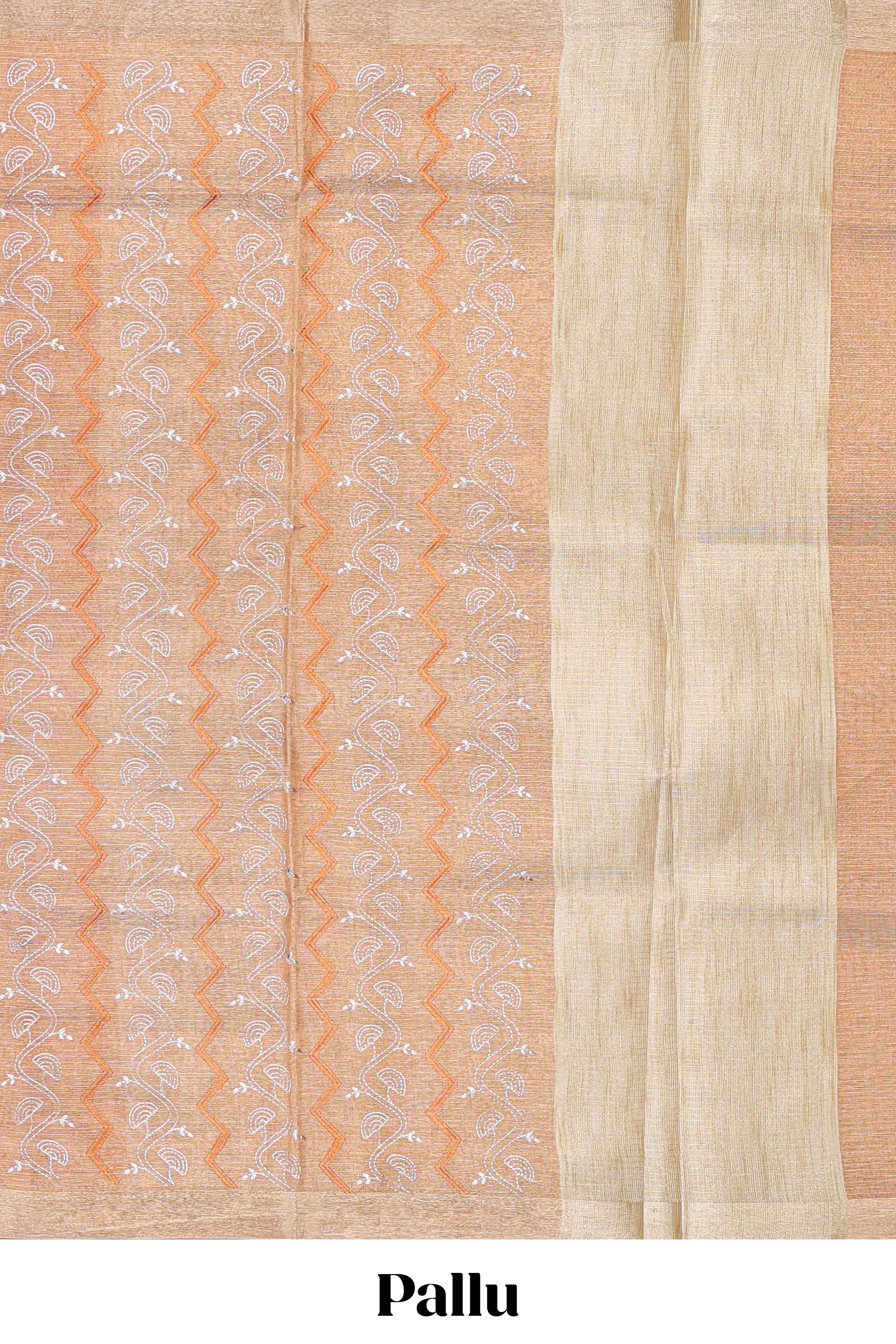 Copper geometric and floral motifs art tissue saree with self zari border and contrastr blouse