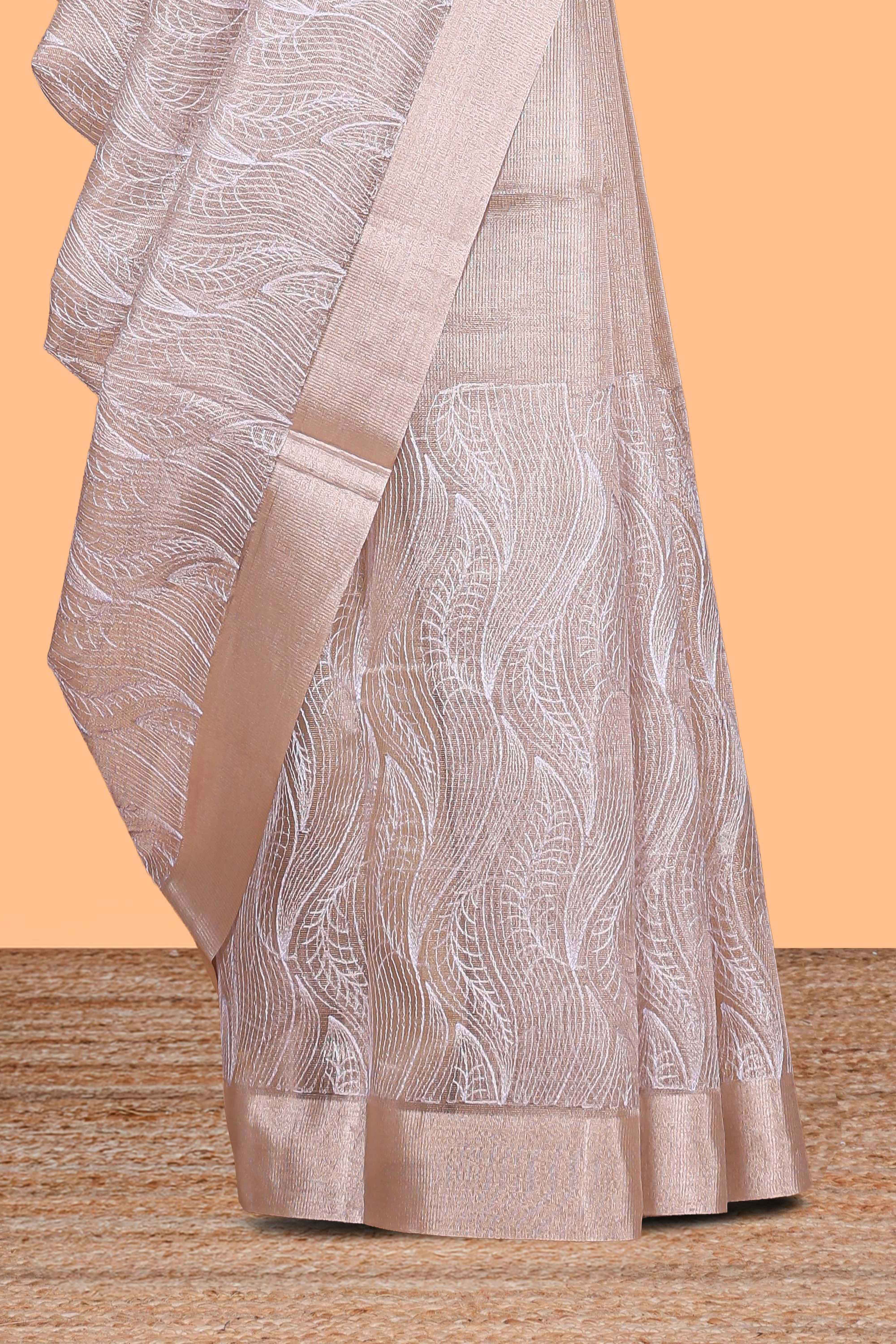 Pearl Ivory flowing leaf and wavy vine pattern art tissue saree with self zari border and contrastr blouse