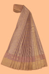 Faded peach motifs design tissue saree with contrast border and matching blouse