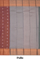 Brick red striped tissue saree with contrast zari border and blouse