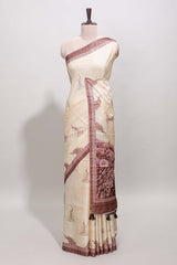 Cream peacock motifs tussar saree with contrast brown border and peacock printed pallu