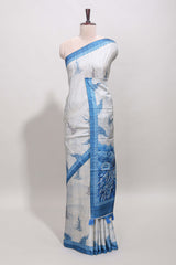Cream peacock motifs tussar saree with contrast blue border and peacock printed pallu