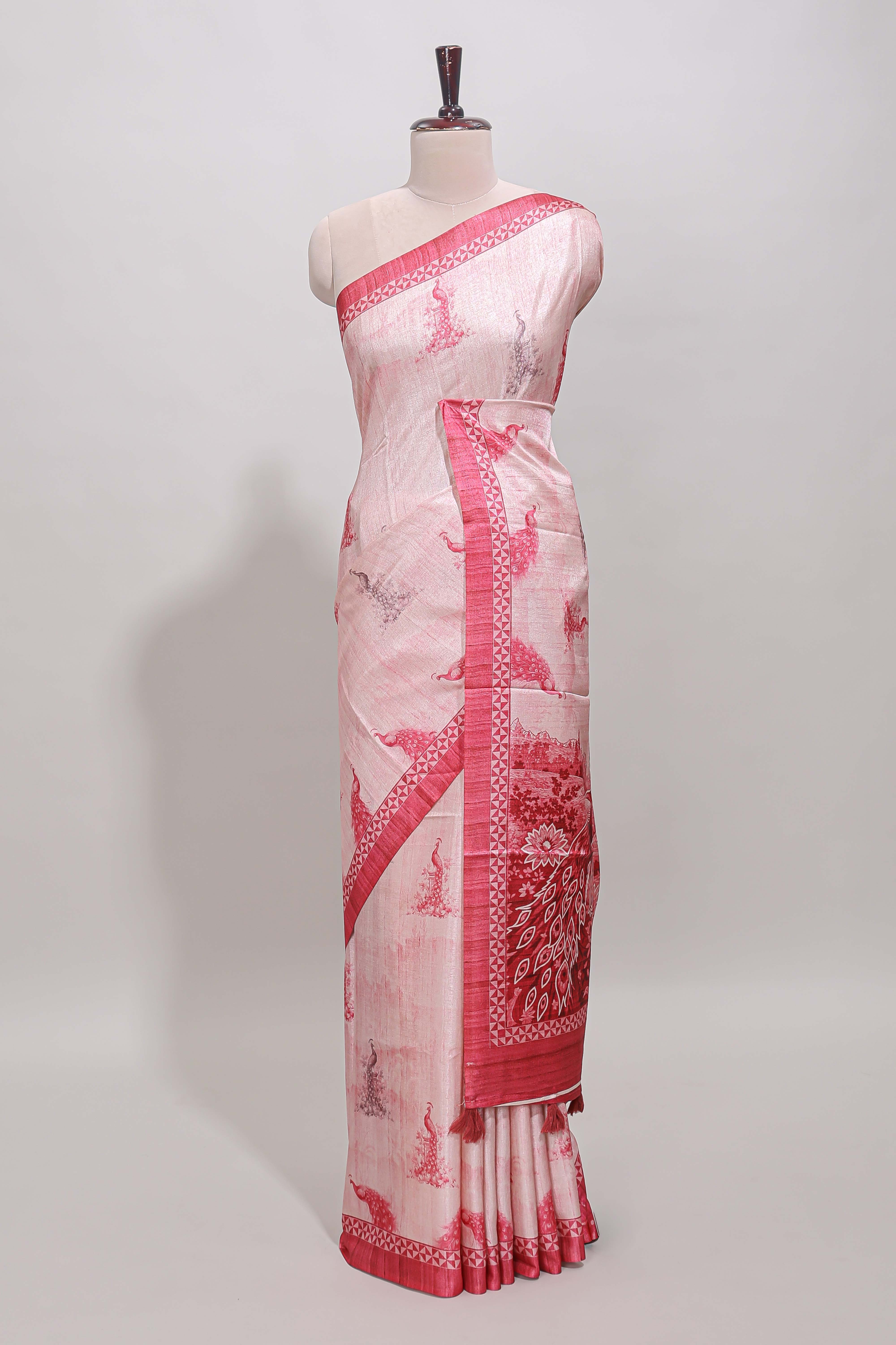 Cream peacock motifs tussar saree with contrast rani pink border and peacock printed pallu