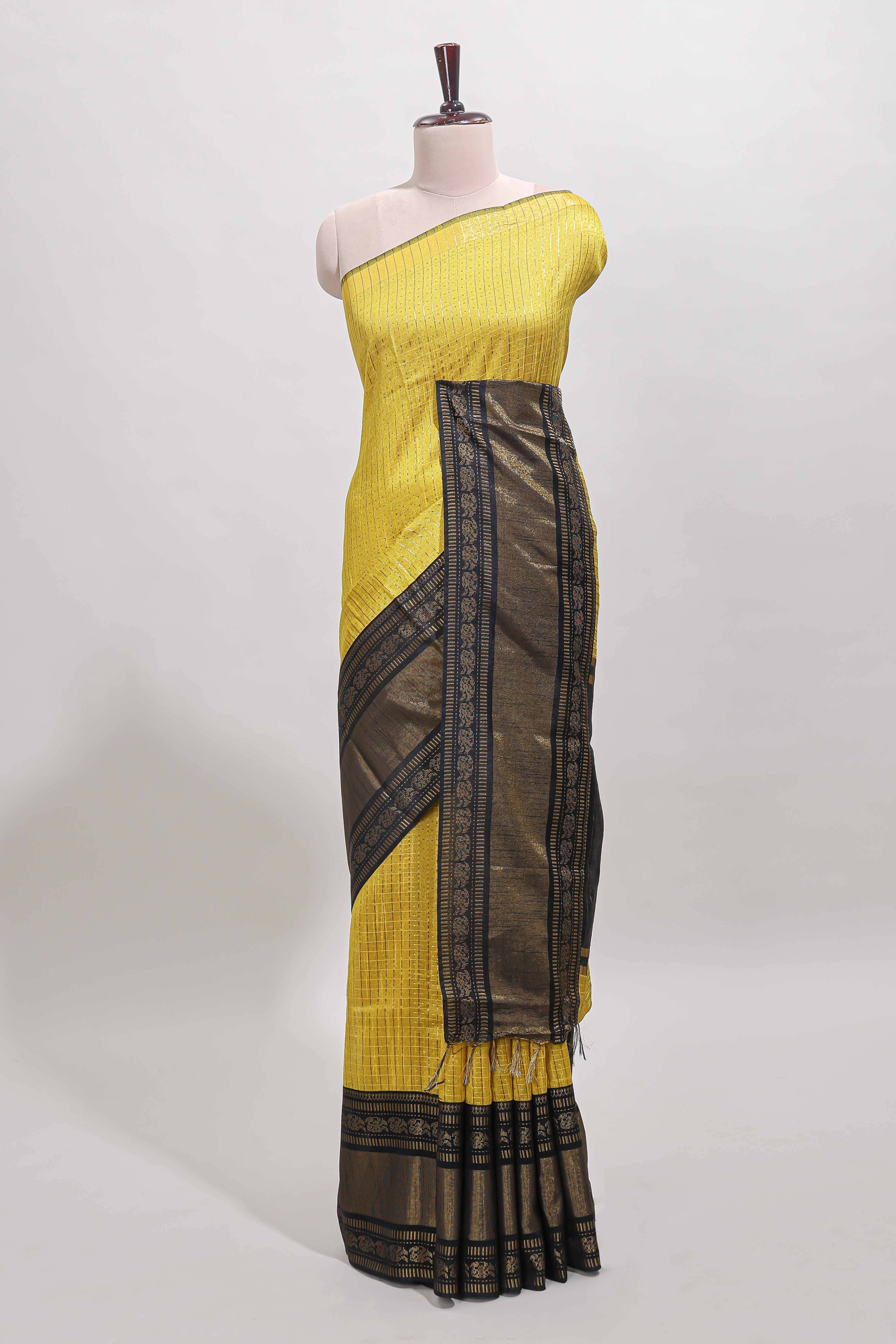 Yellow checked tussar saree with contrast black zari border and checked blouse