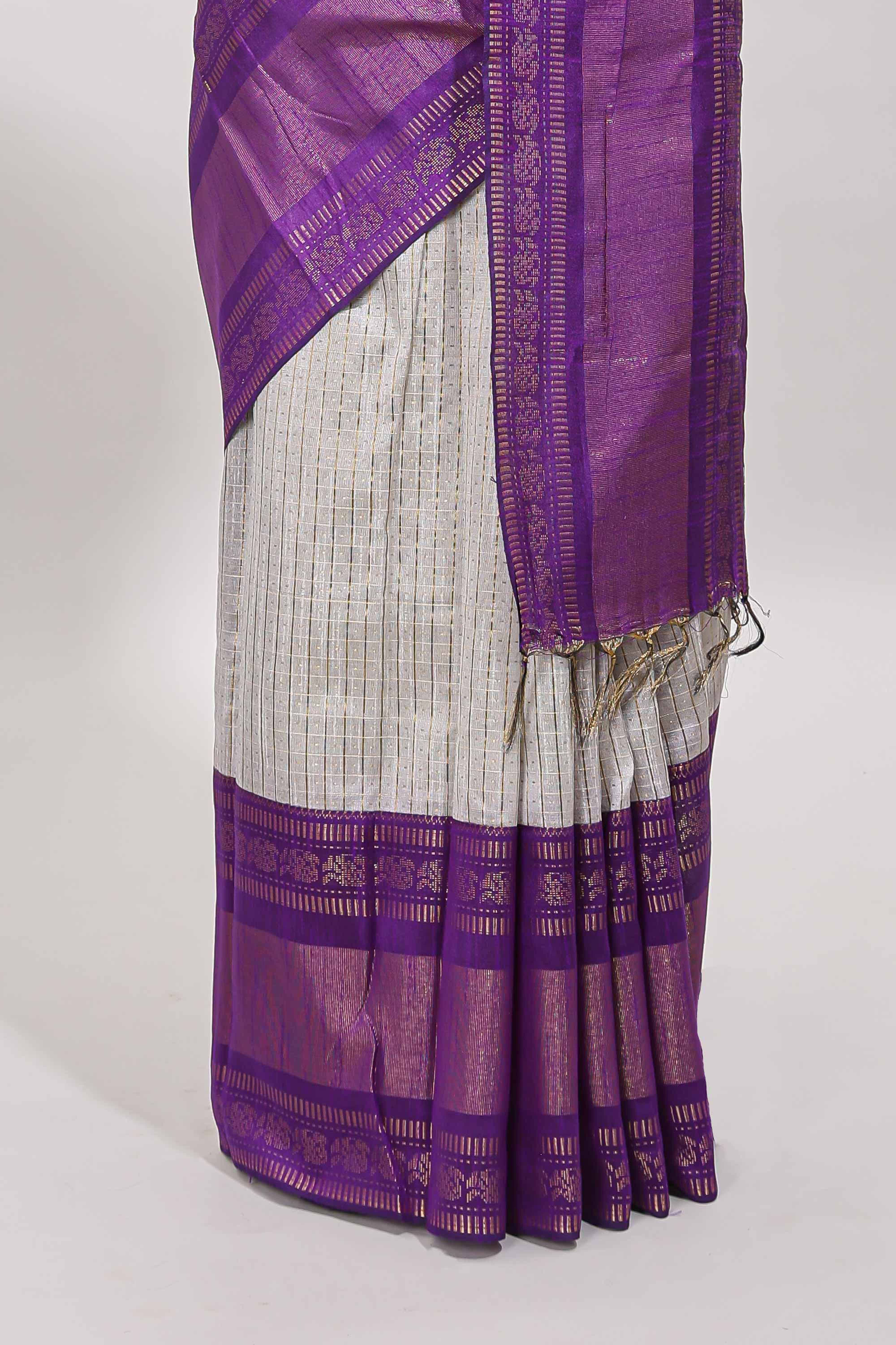 White checked tussar saree with contrast violet zari border and checked blouse