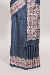 Blue ikkat style tussar saree with contrast border and printed Pallu