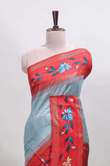 Blue checked semi tussar saree with contrast floral vine border and blouse