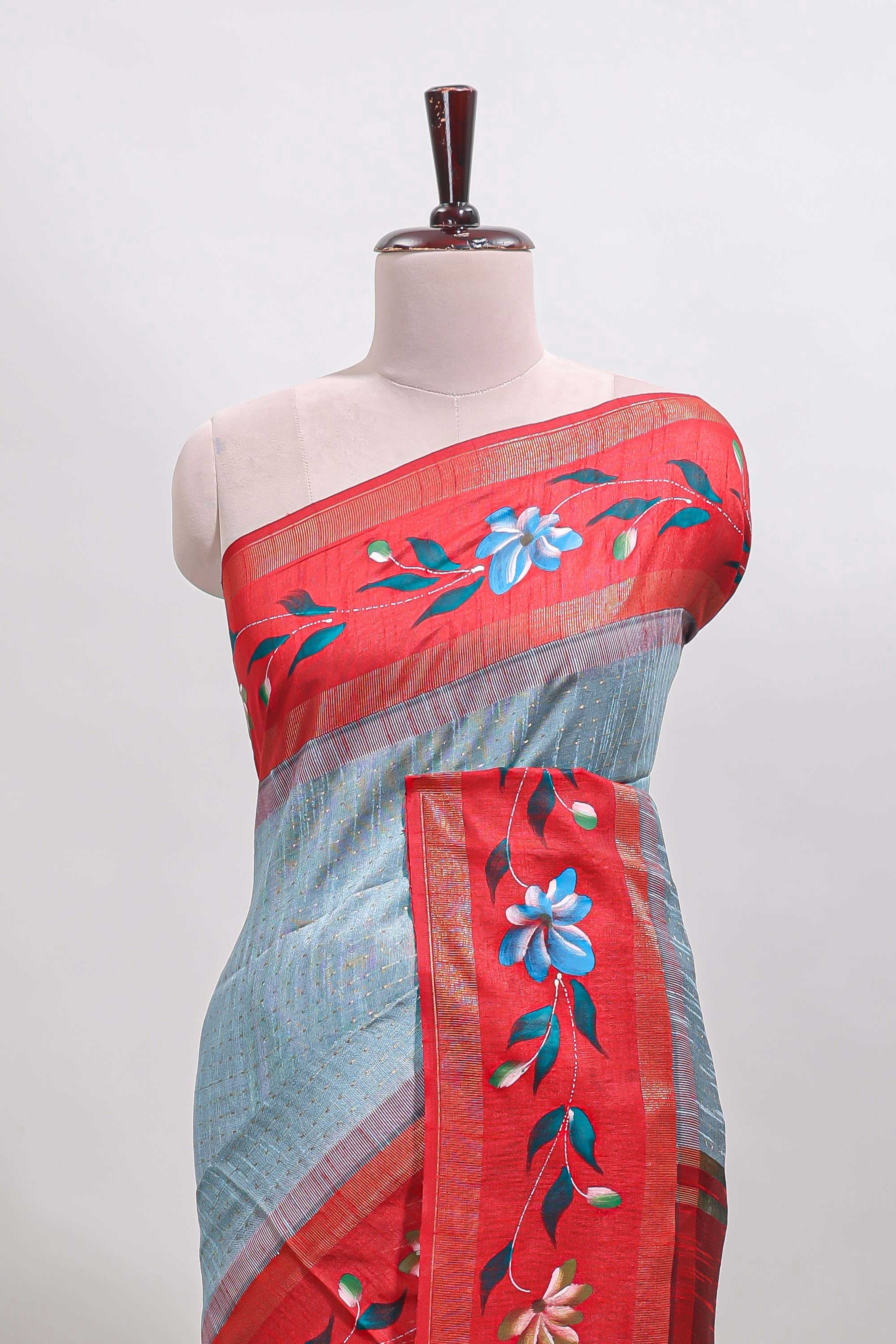 Blue checked semi tussar saree with contrast floral vine border and blouse