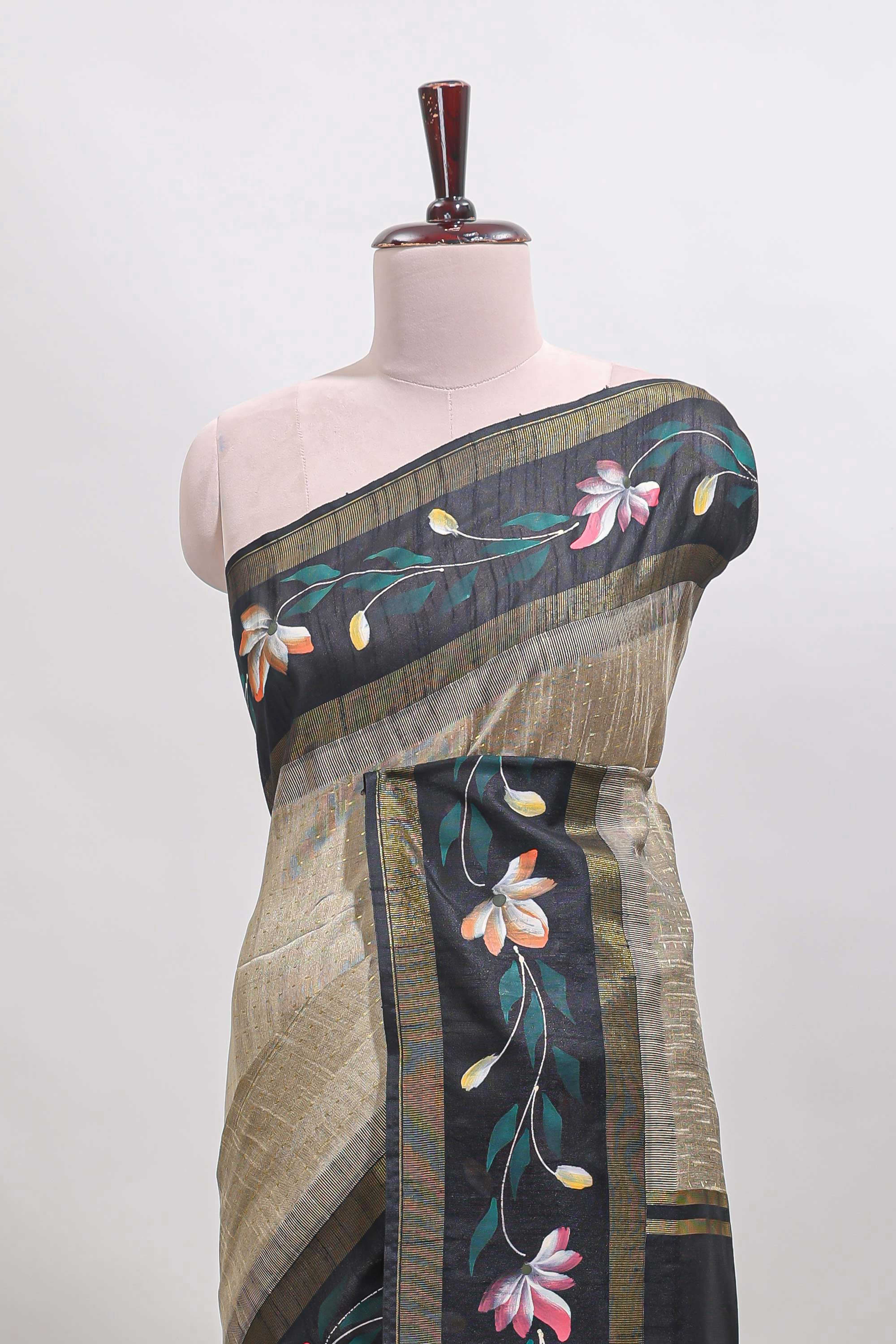 Beige checked semi tussar saree with contrast floral vine border and blouse
