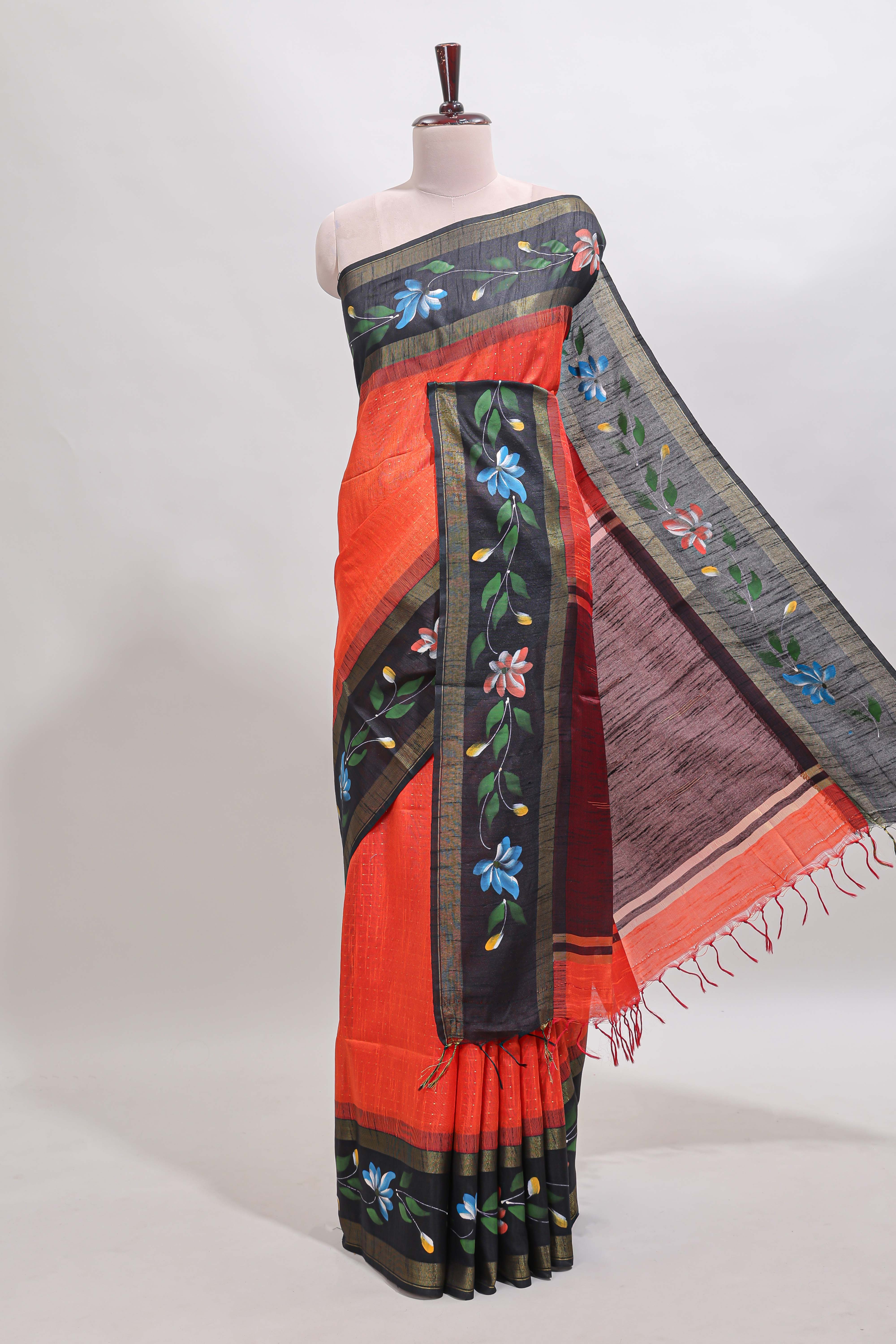 Orange checked semi tussar saree with contrast floral vine border and blouse