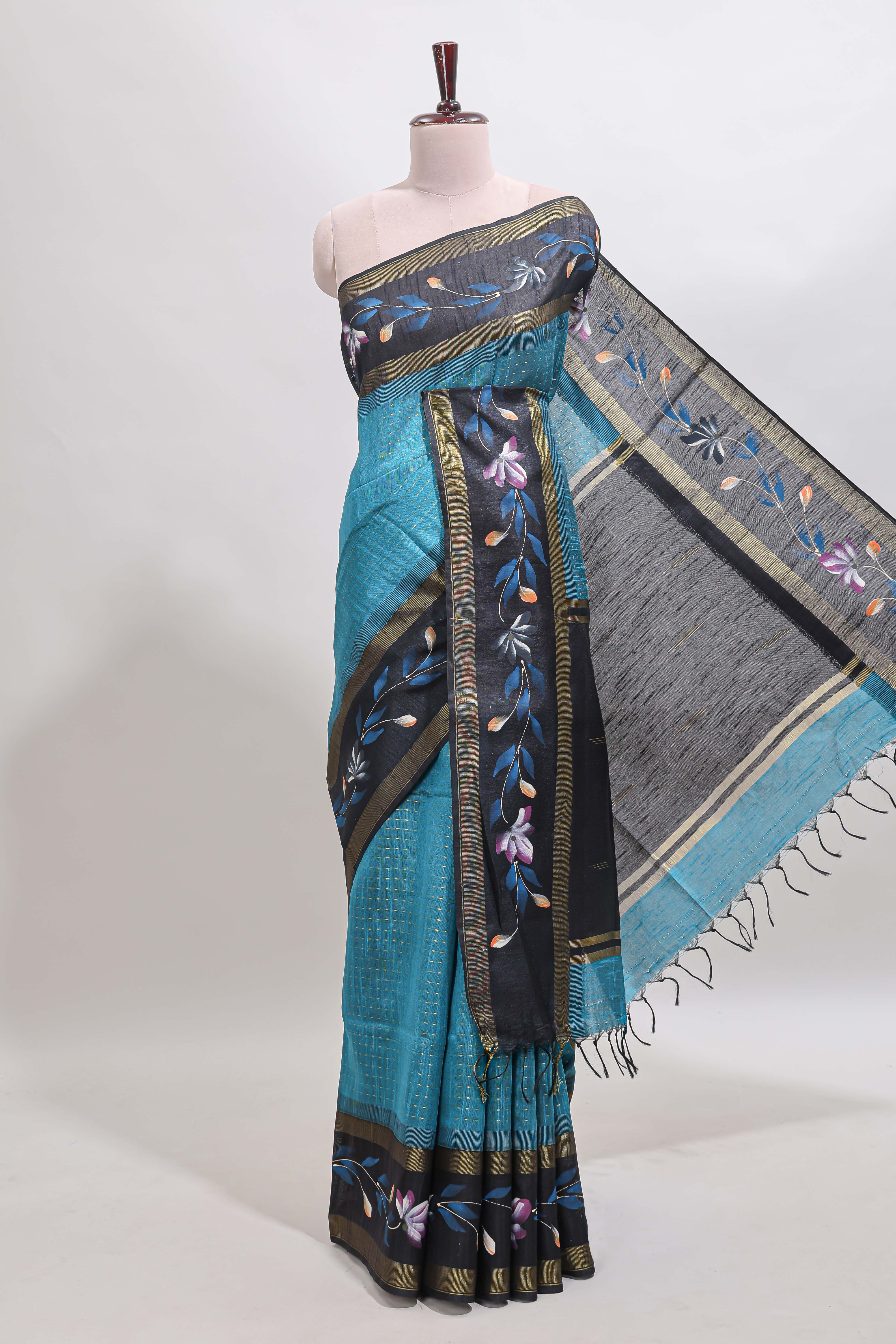Teal blue checked semi tussar saree with contrast floral vine border and blouse