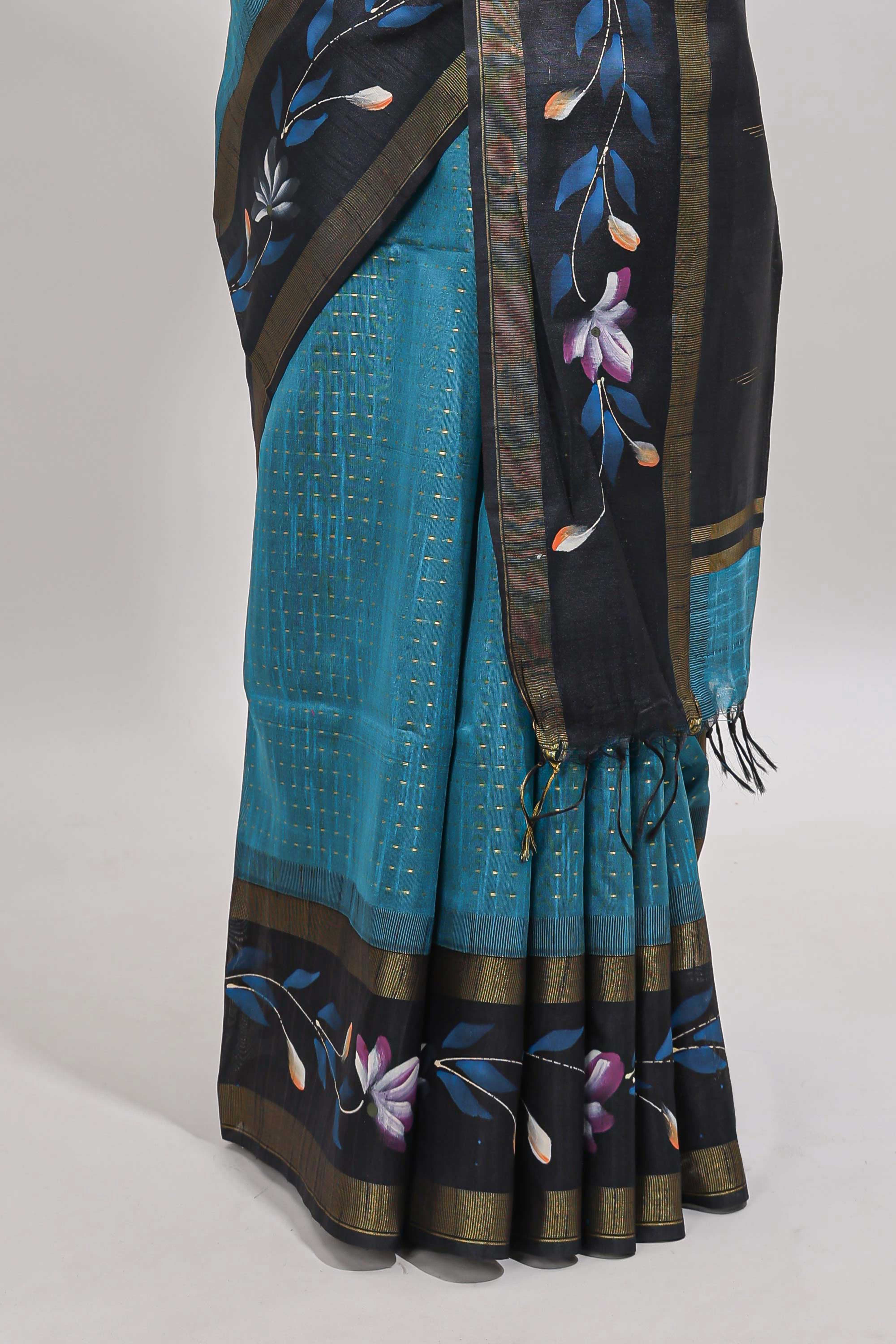 Teal blue checked semi tussar saree with contrast floral vine border and blouse