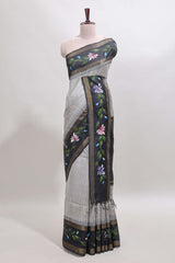 Grey checked semi tussar saree with contrast violet floral vine border and blouse