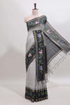Grey checked semi tussar saree with contrast violet floral vine border and blouse