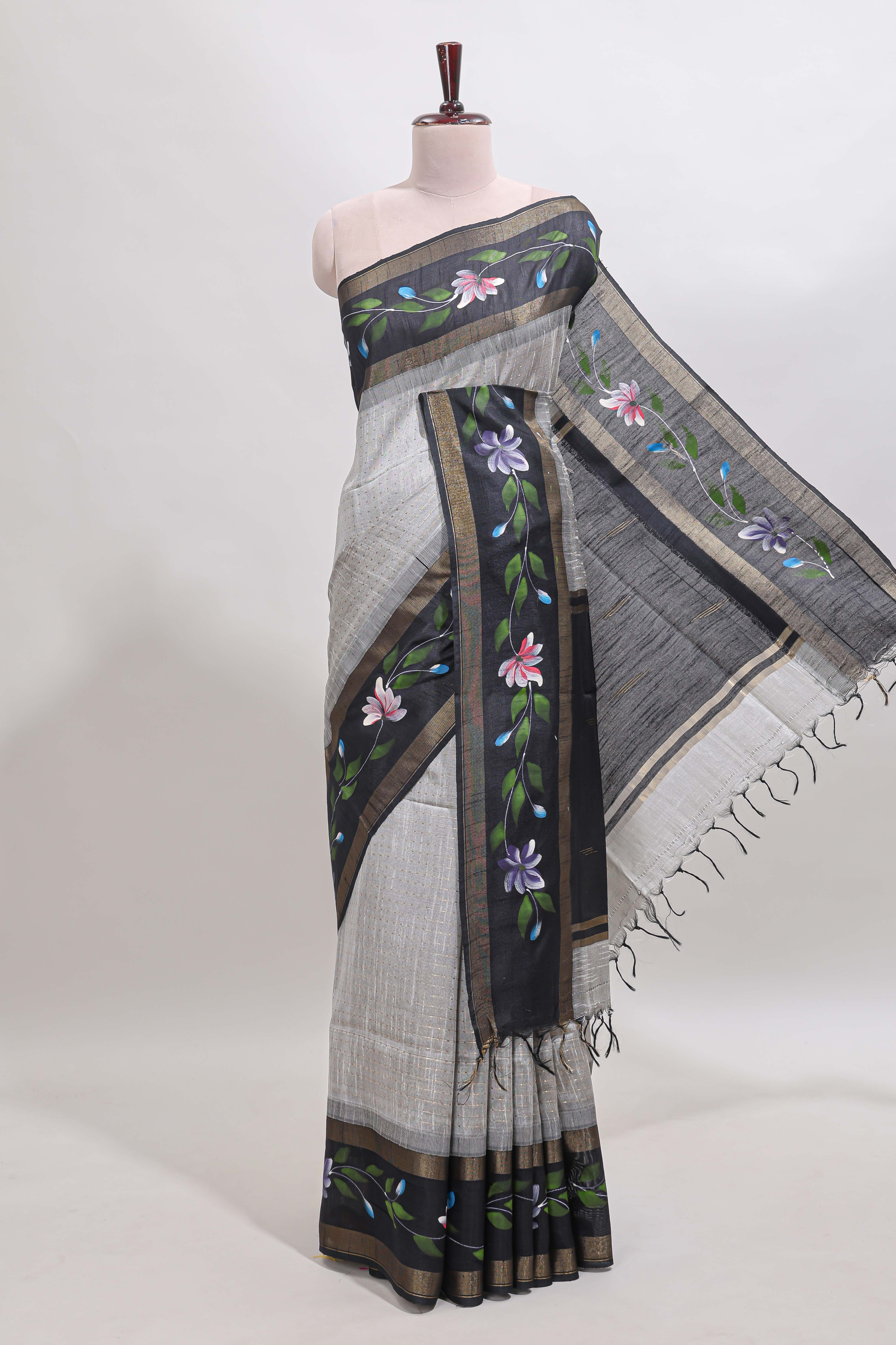 Grey checked semi tussar saree with contrast violet floral vine border and blouse