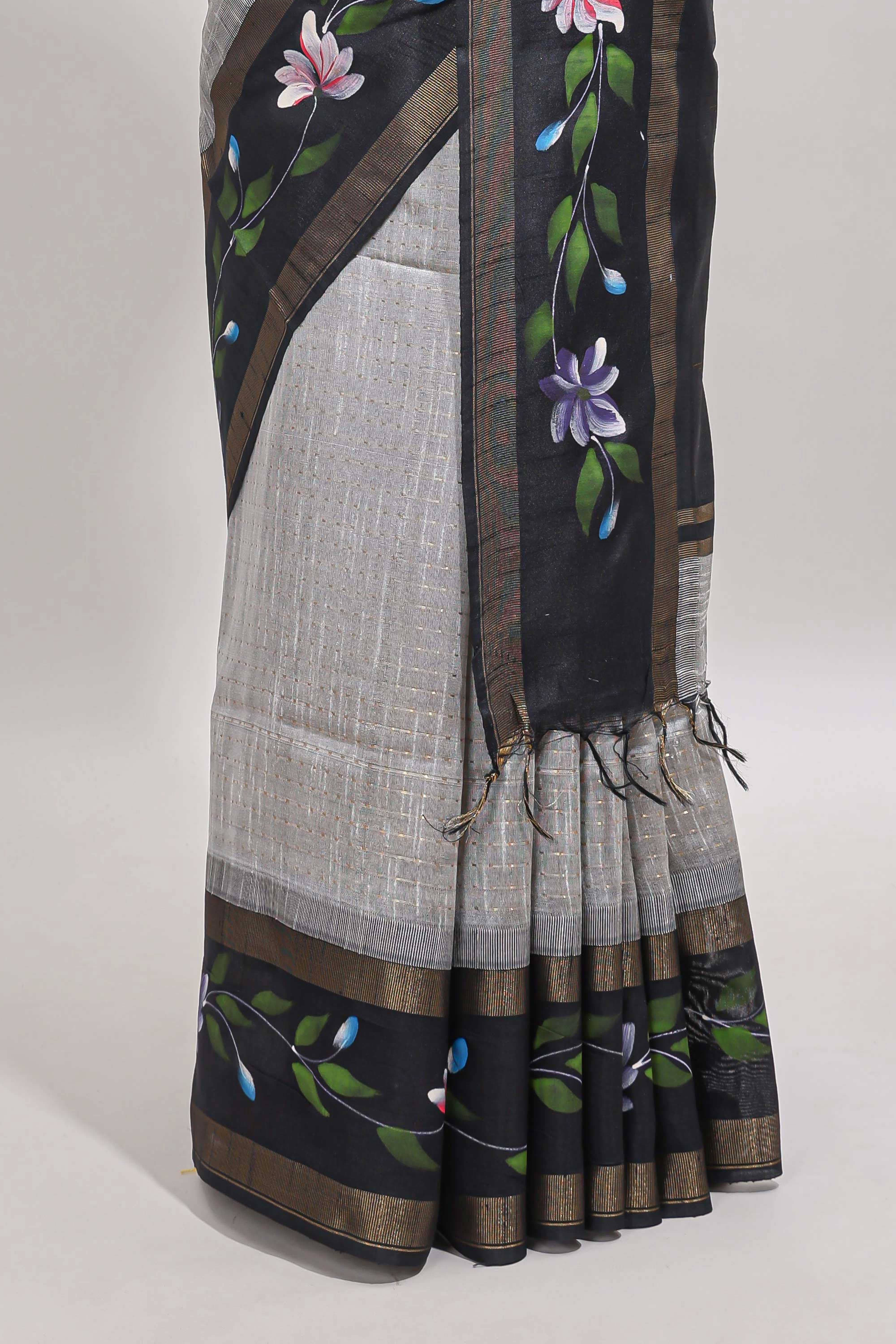 Grey checked semi tussar saree with contrast violet floral vine border and blouse