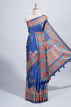 Blue madhubani style floral & peacock design tussar saree with self border and matching blouse