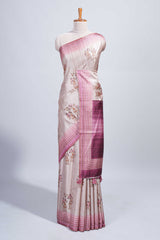 Beige floral & cage print motifs tussar saree with contrast border and blouse