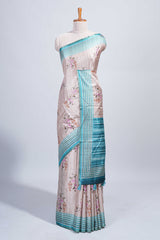 Beige floral & cage print motifs tussar saree with contrast border and blouse