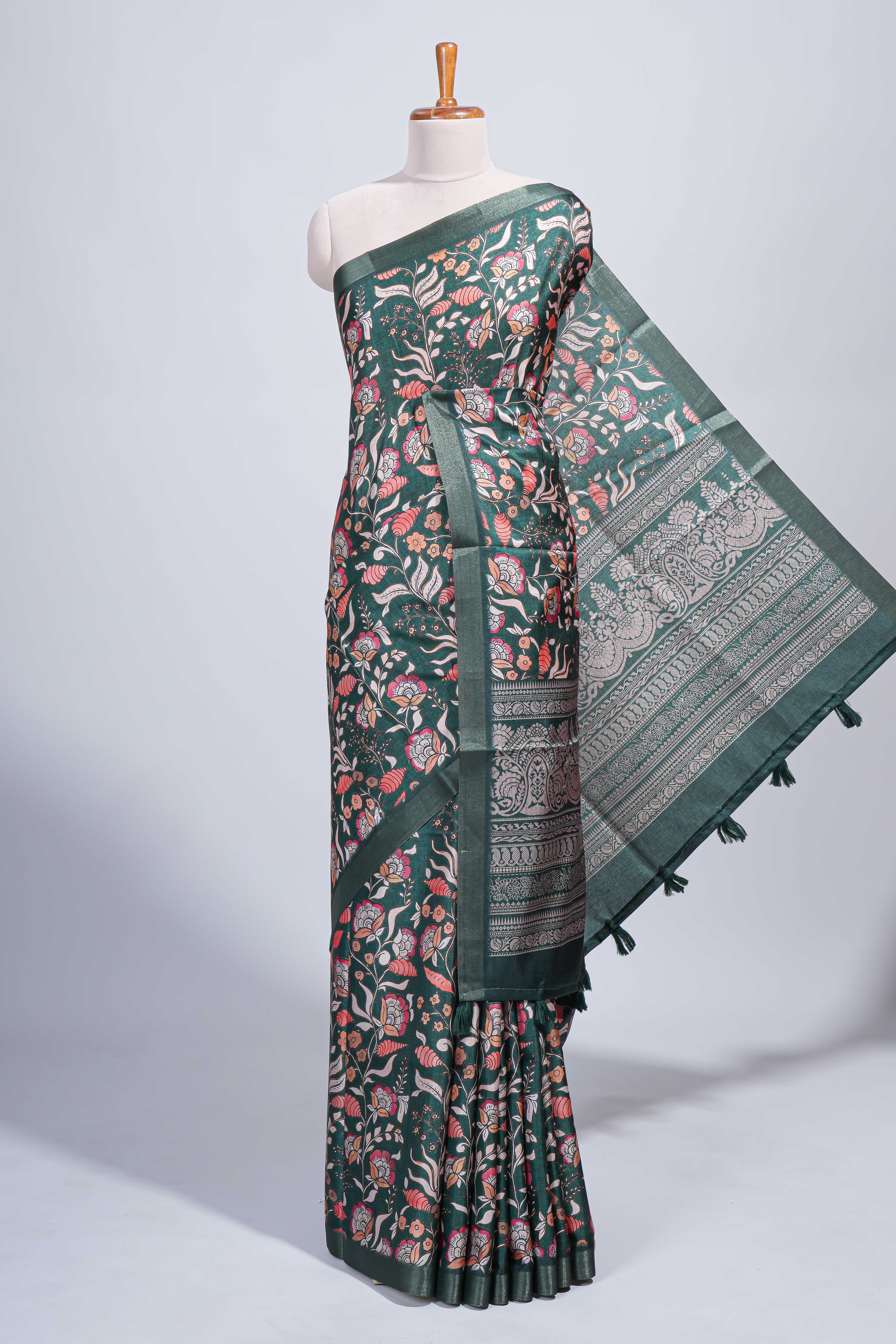 Green floral design tussar saree with self zari border and matching blouse
