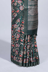 Green floral design tussar saree with self zari border and matching blouse