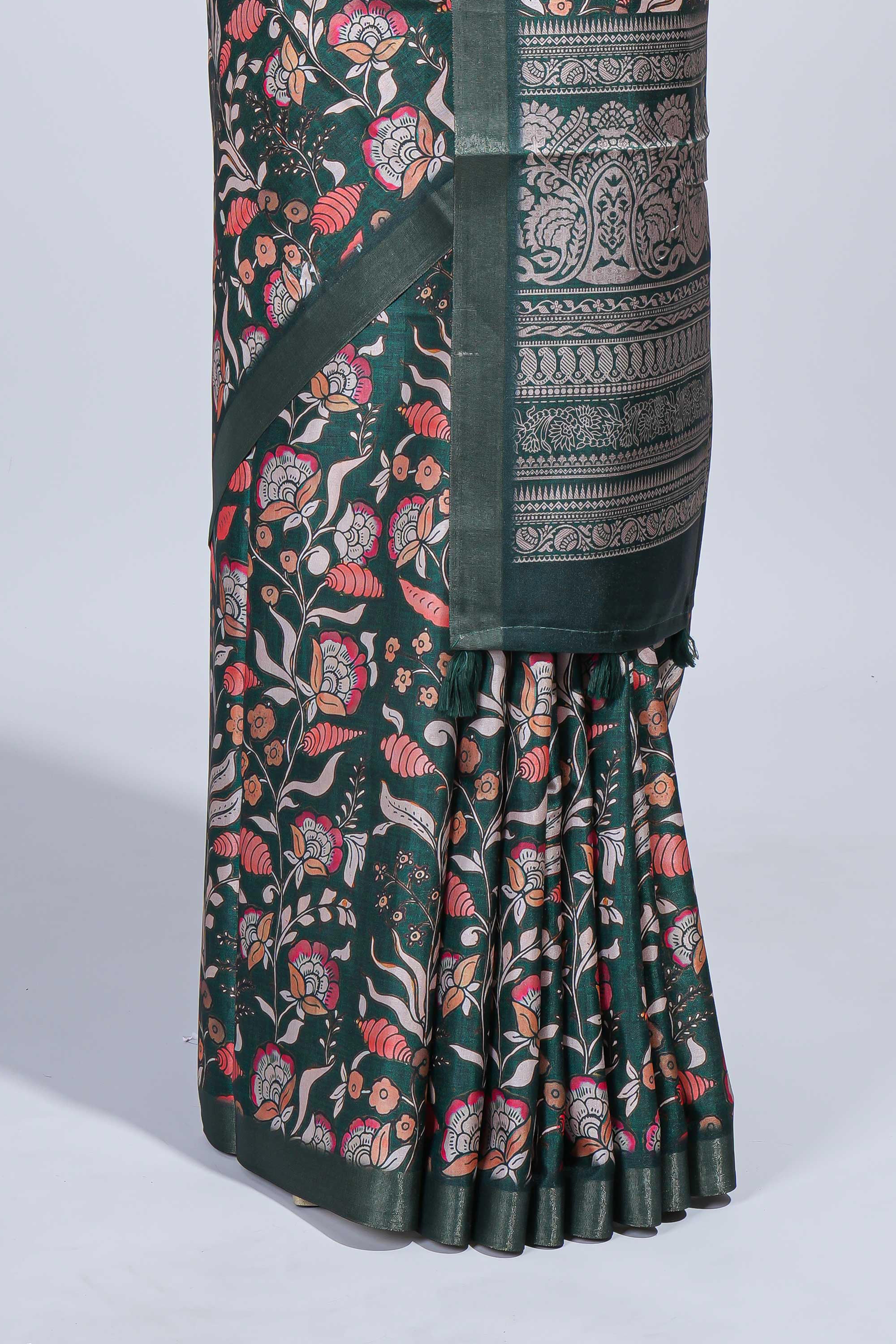 Green floral design tussar saree with self zari border and matching blouse